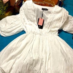 Pretty Little Things puff sleeve & hem mini dress